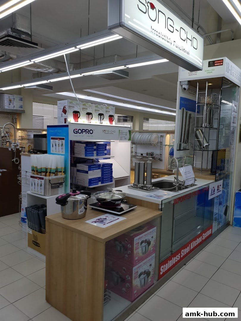Interior view of a kitchenware store showcasing various products and displays.