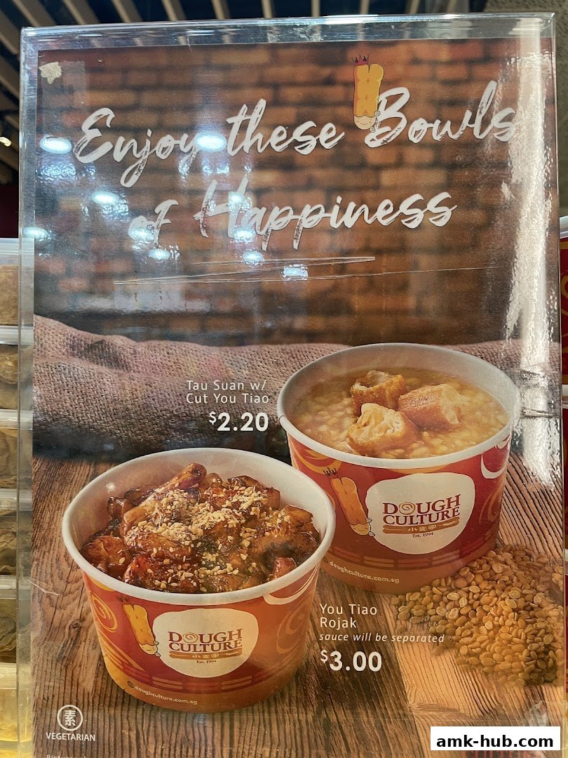 A menu board from Dough Culture featuring two bowls of food and their prices.