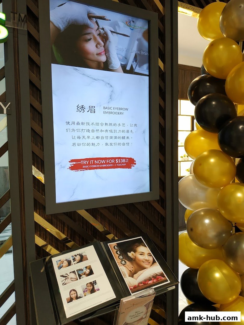 A digital display advertises eyebrow embroidery services with a special offer.
