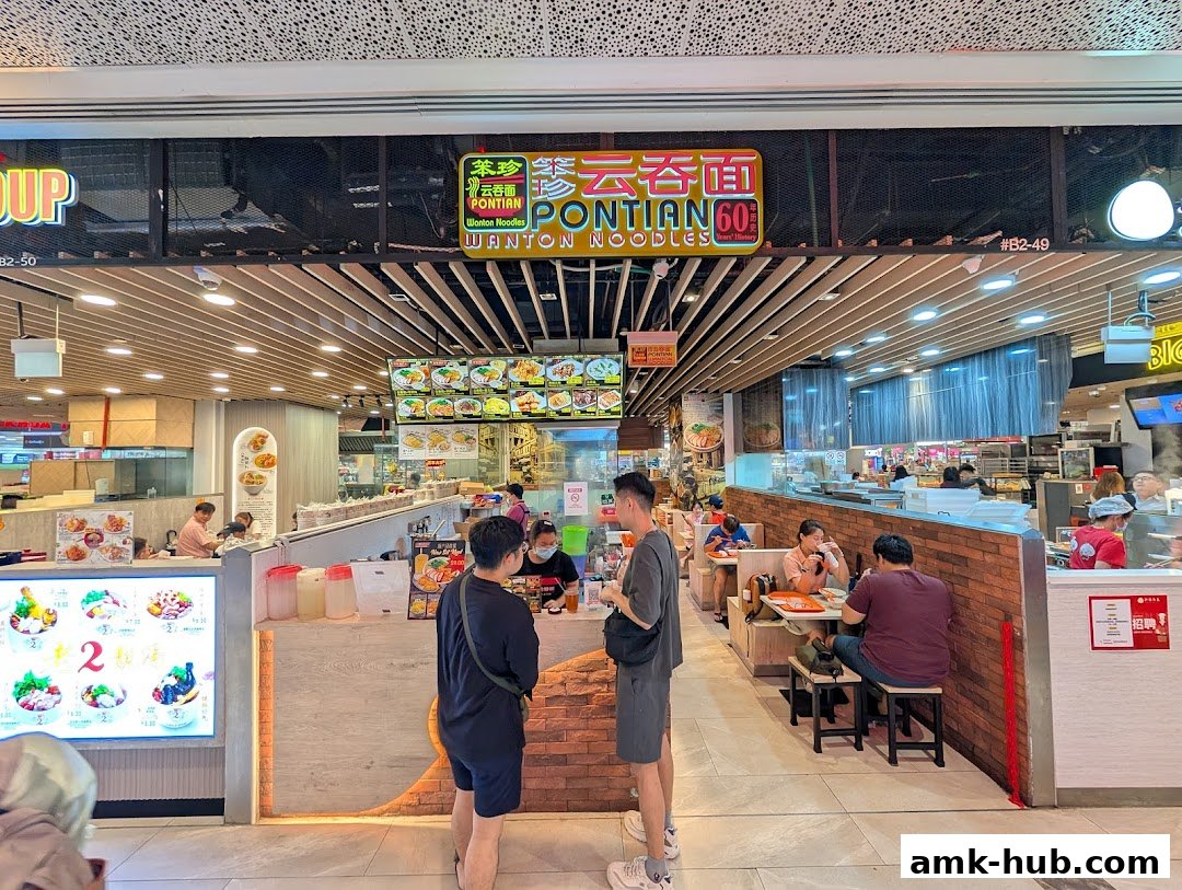 Pontian Wanton Noodles shop with customers dining and ordering at the counter.