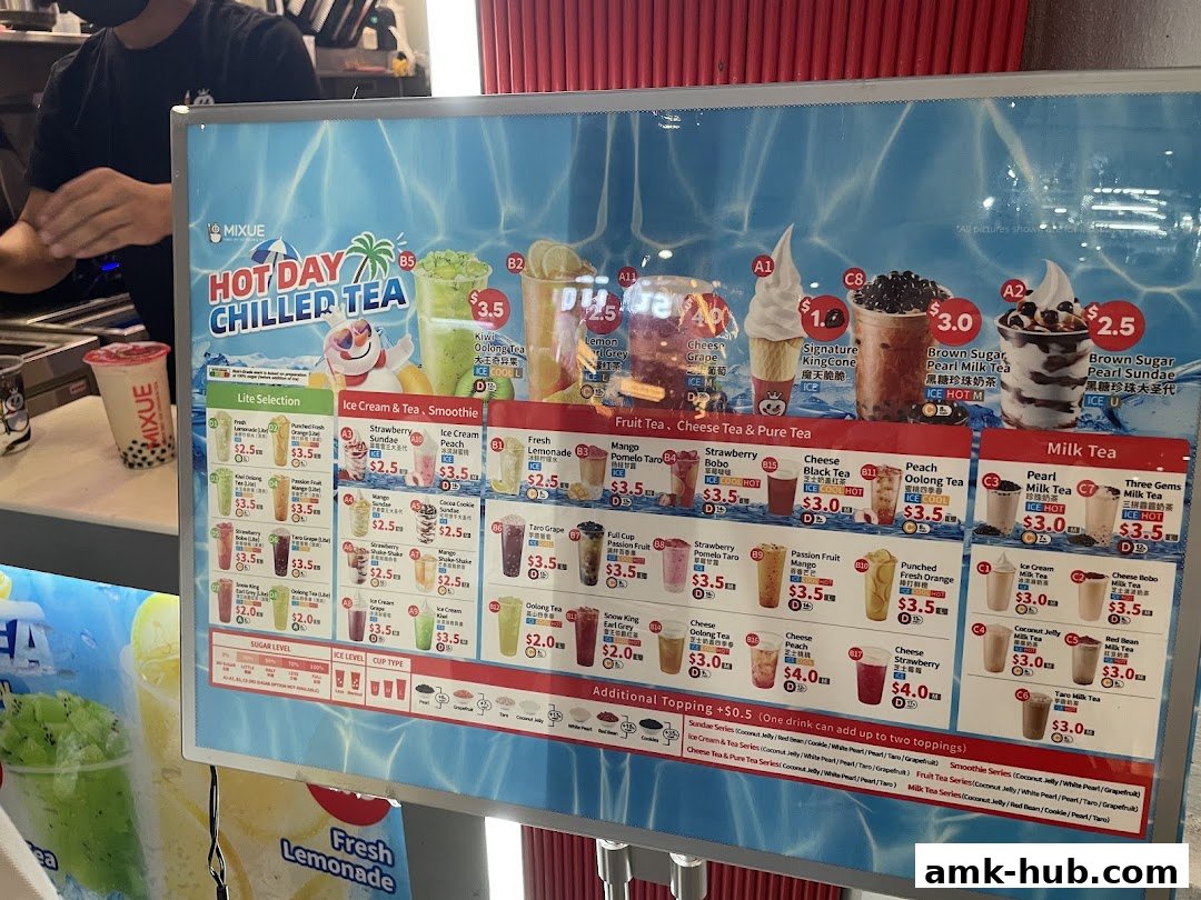 A menu board displaying various chilled teas, ice cream, and smoothies with prices.