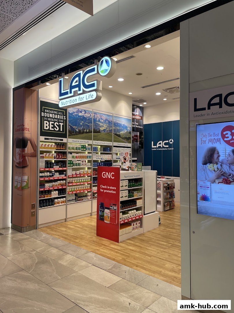 The exterior of a LAC Nutrition store, showcasing shelves stocked with health supplements and a promotional display.