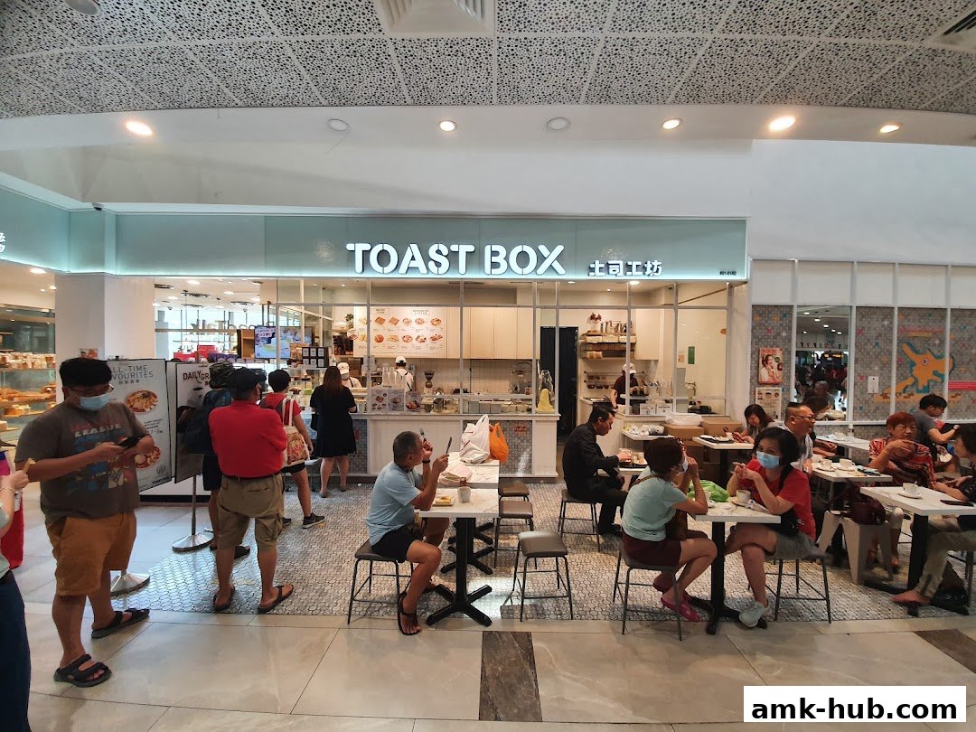 People dining and queuing at Toast Box AMK Hub.
