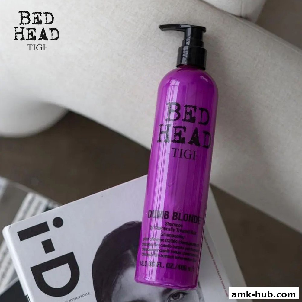 A purple bottle of Bed Head TIGI Dumb Blonde shampoo sits on an i-D magazine.