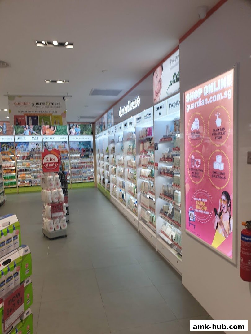 Interior view of a Guardian Health & Beauty store showcasing shelves stocked with products and promotional displays.
