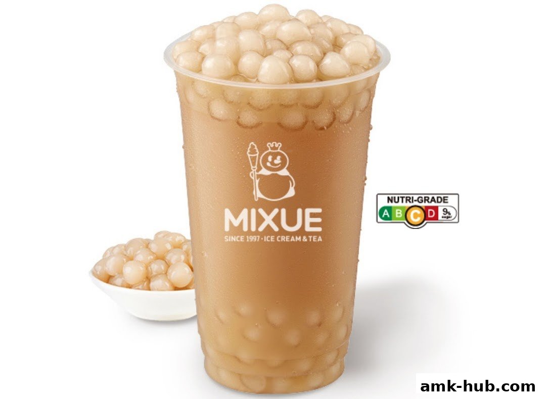 A refreshing MIXUE ice cream and tea drink with tapioca pearls and a Nutri-Grade label.