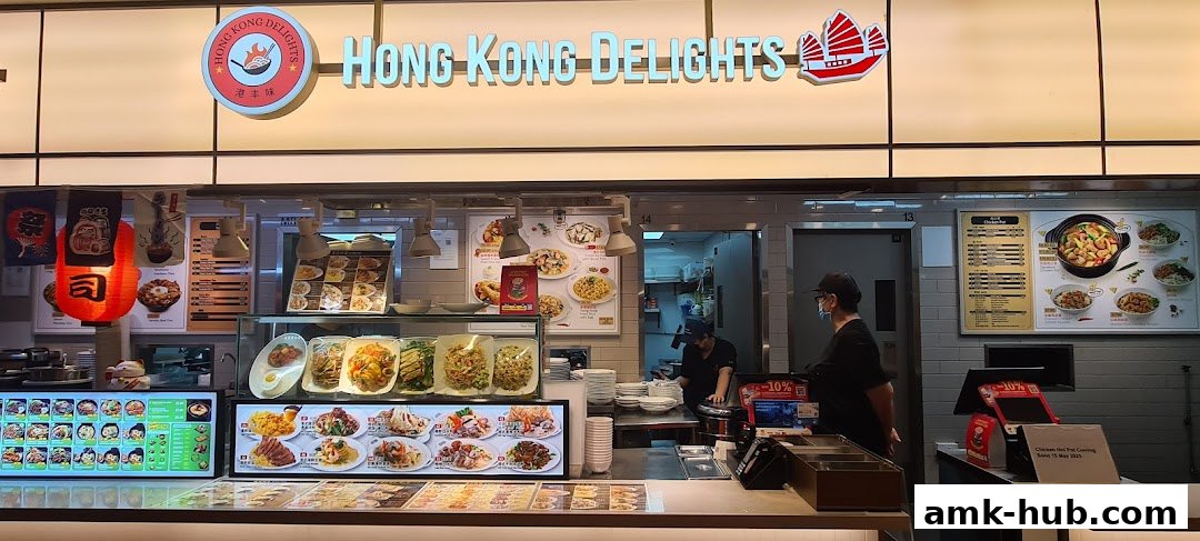 A brightly lit food stall with a variety of Hong Kong-style dishes displayed.