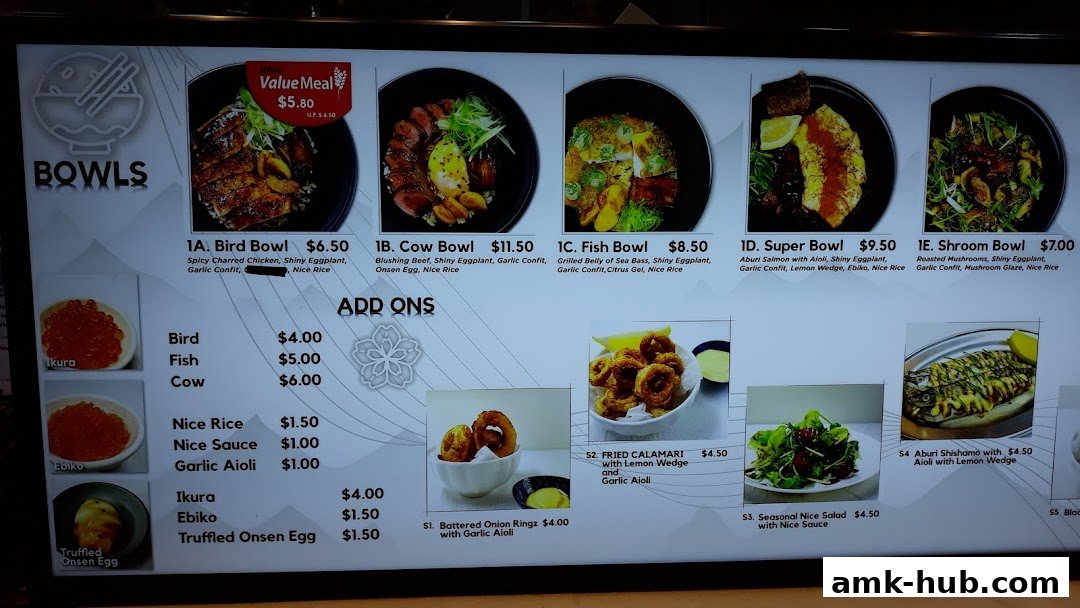 A menu board displaying various bowls, add-ons, and side dishes with prices and images.