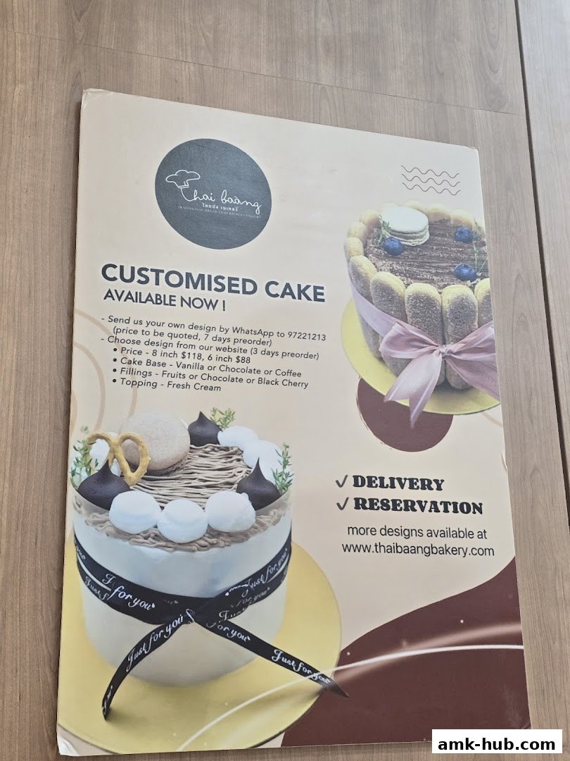 A flyer showcasing customized cakes from Thai Baàng bakery with ordering information.
