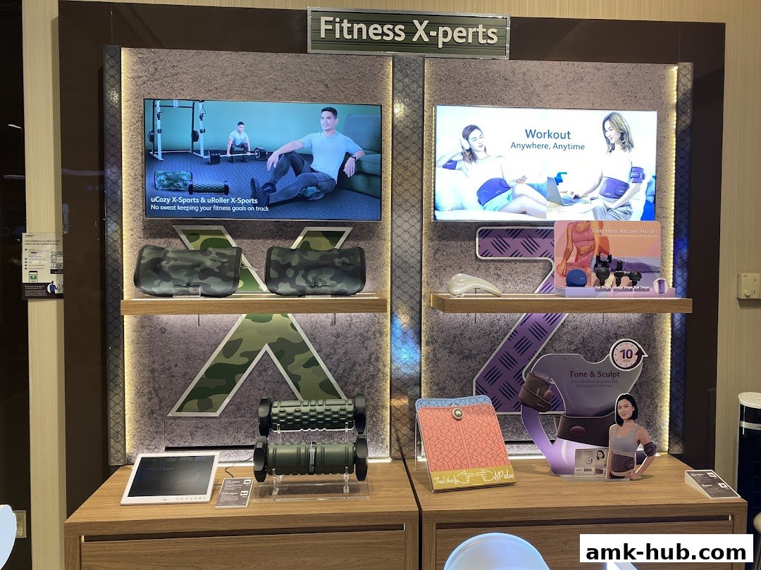OSIM shop display featuring fitness equipment and promotional screens.