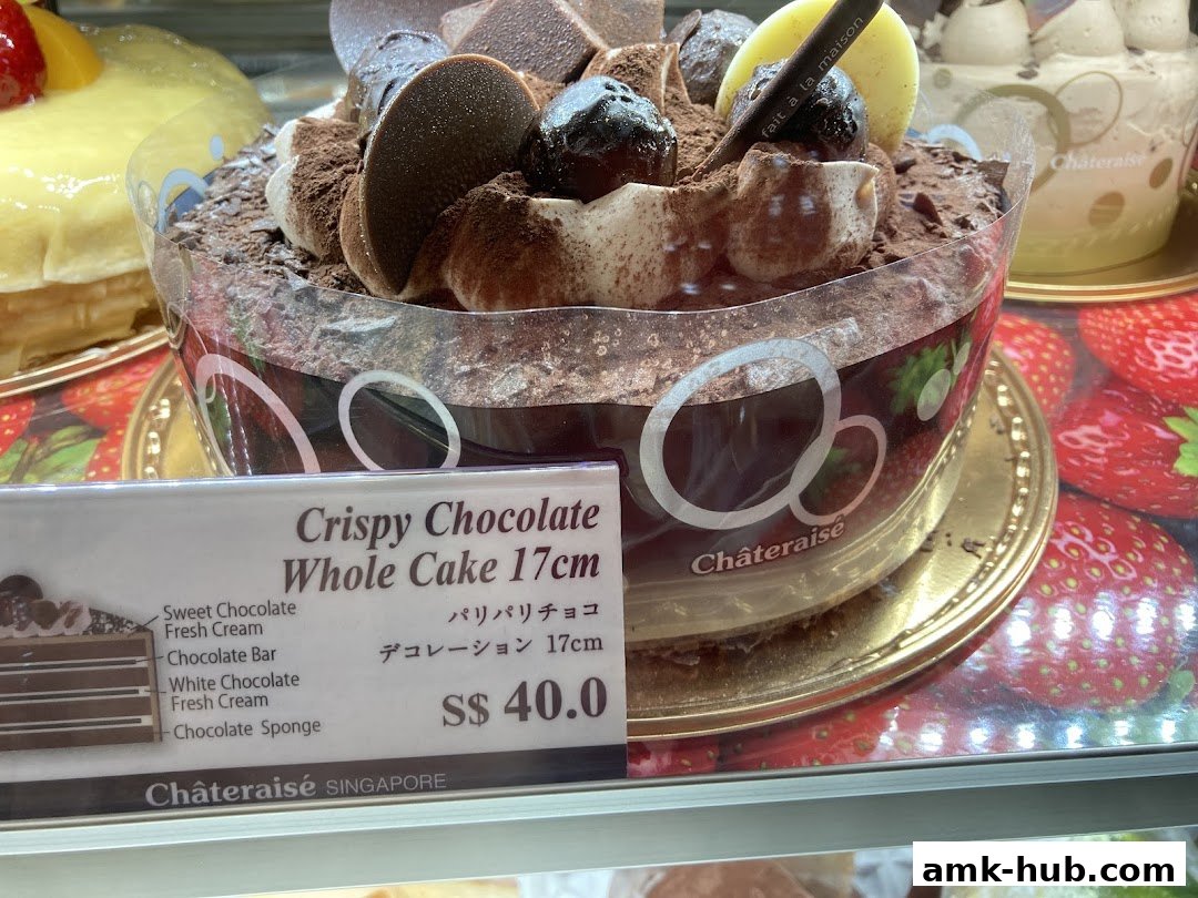A close-up of a decadent chocolate cake with a price tag and description.