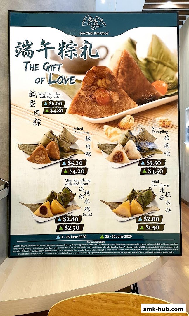 A menu board showcasing various types of dumplings with prices and images.