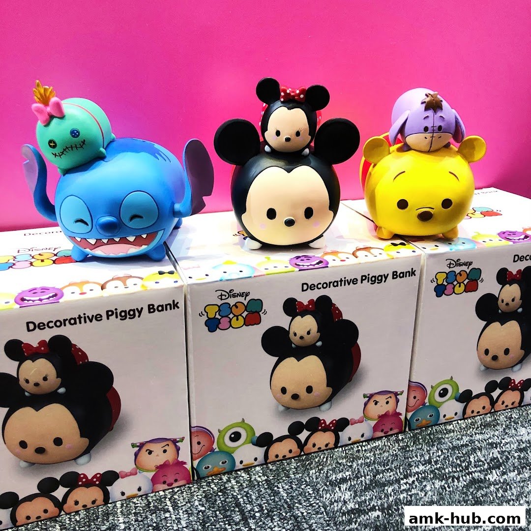 Disney Tsum Tsum decorative piggy banks featuring Stitch, Mickey, and Pooh characters.