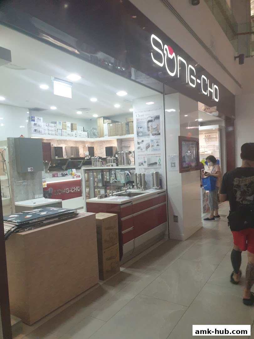 The exterior of the Song-Cho kitchenware store, showcasing kitchen displays and products.