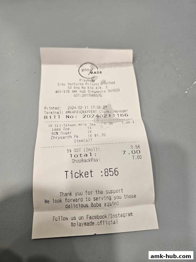 A receipt from Playground by PlayMade showing a Taiwan Milk Tea order and payment details.