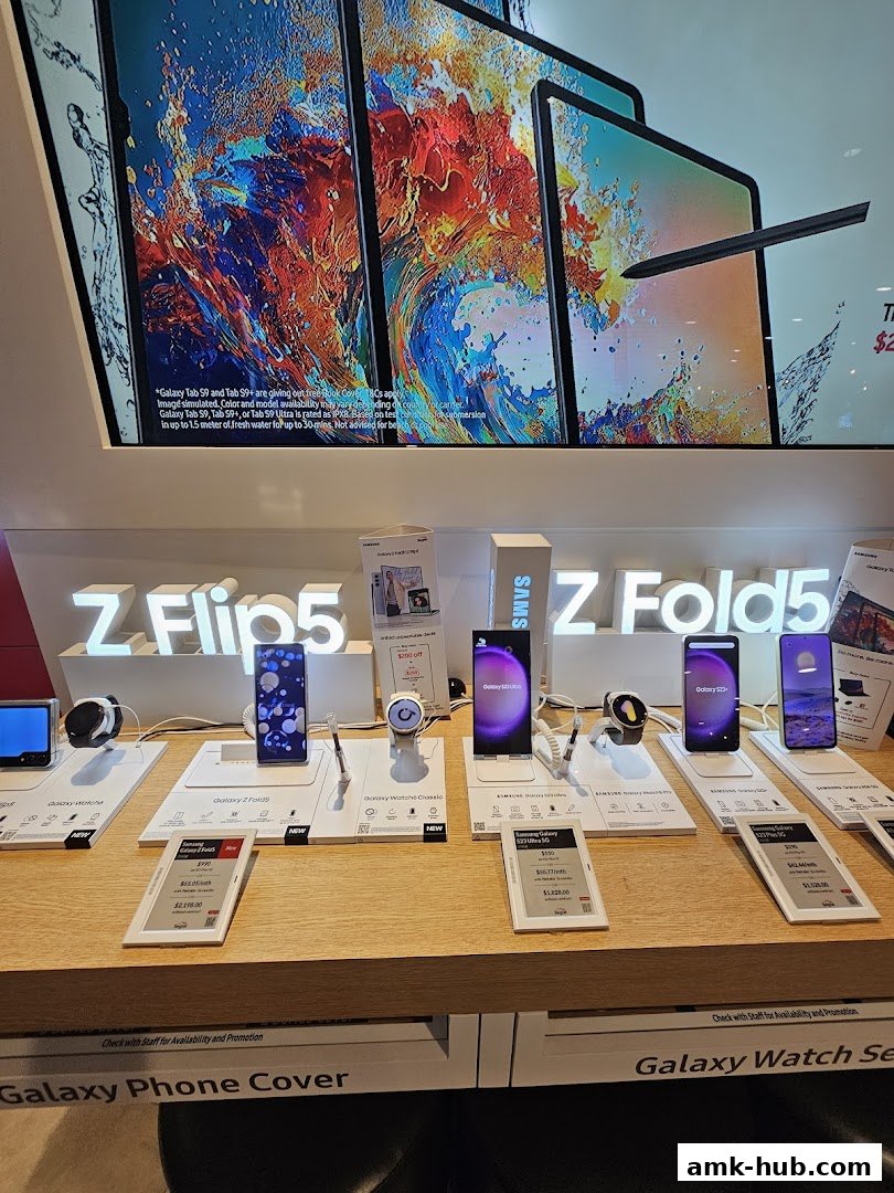 Display of Samsung Galaxy Z Fold5 and Z Flip5 phones, along with Galaxy Watches.