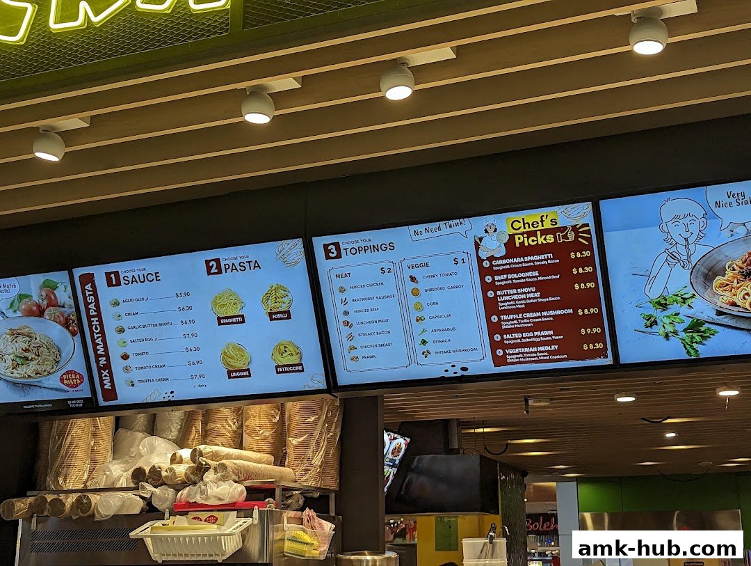 Digital menu boards displaying pasta sauces, pasta types, toppings, and chef's special picks.