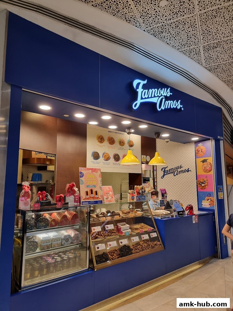 Famous Amos cookie shop with a display of cookies and gift boxes.