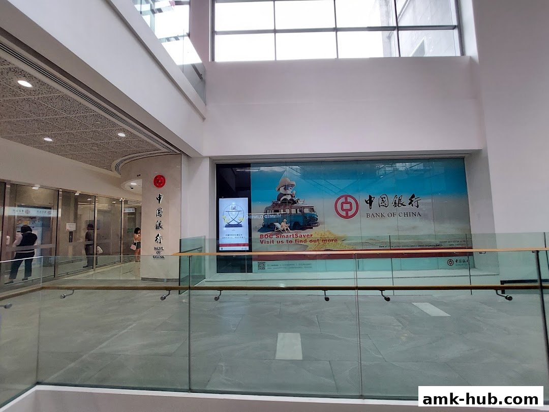 The Bank of China Ang Mo Kio Sub-Branch entrance with a large advertisement.