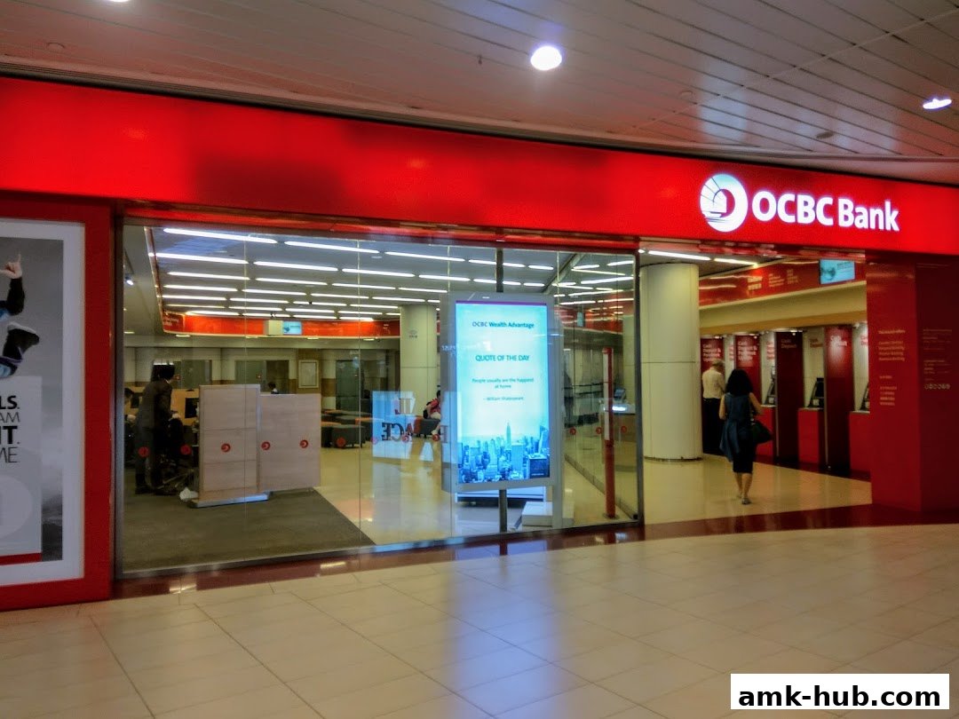 The entrance of OCBC Bank with its prominent red signage and glass facade.