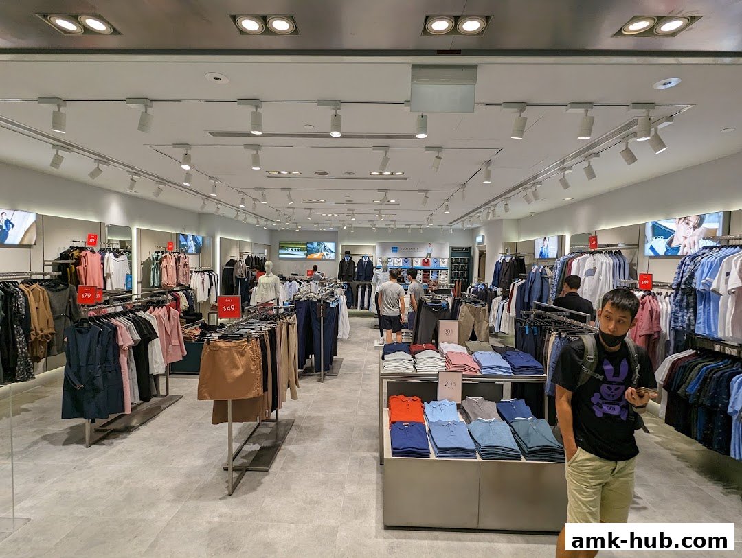 Interior view of a G2000 clothing store with racks of men's and women's apparel.
