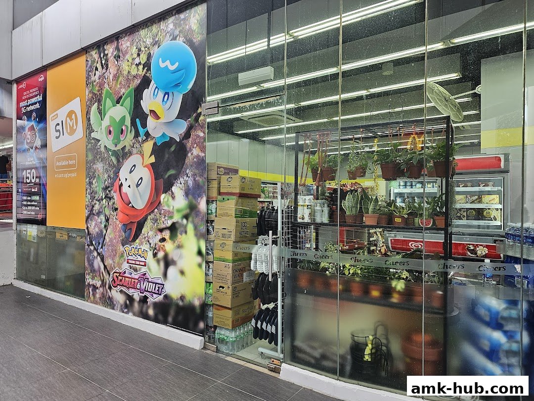 The exterior of a Cheers convenience store with a large Pokemon Scarlet & Violet advertisement.