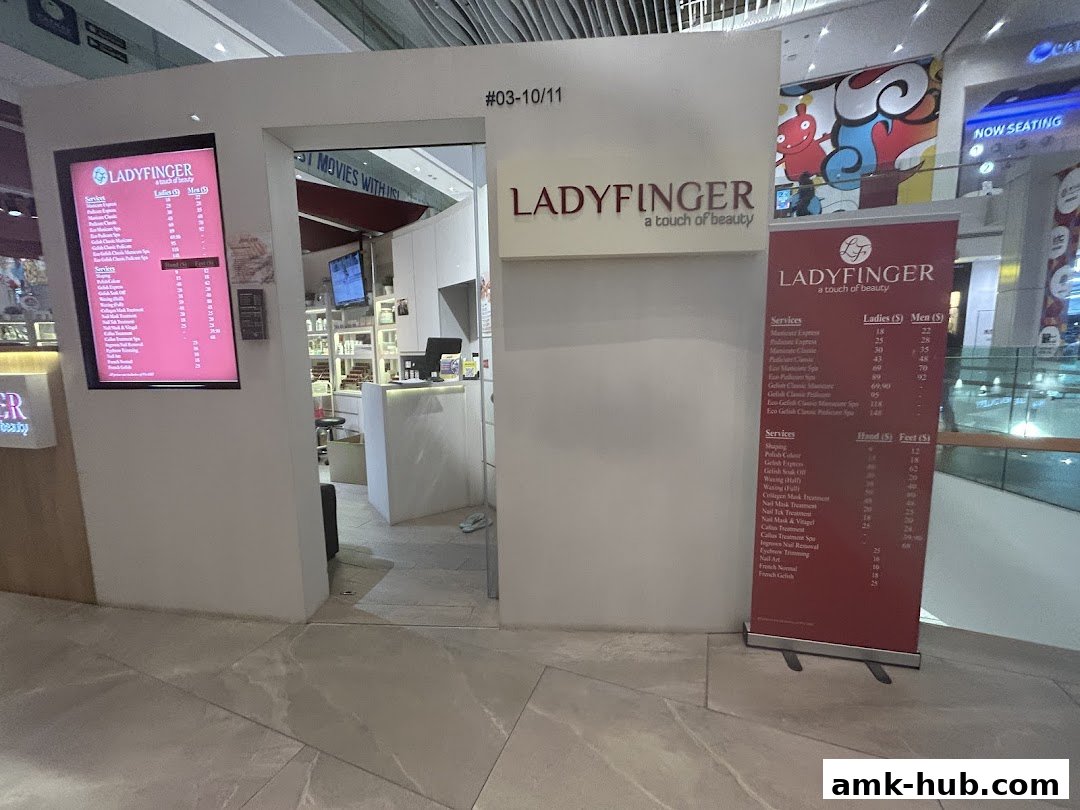 The entrance to Ladyfinger, a beauty salon, with a menu displayed outside.