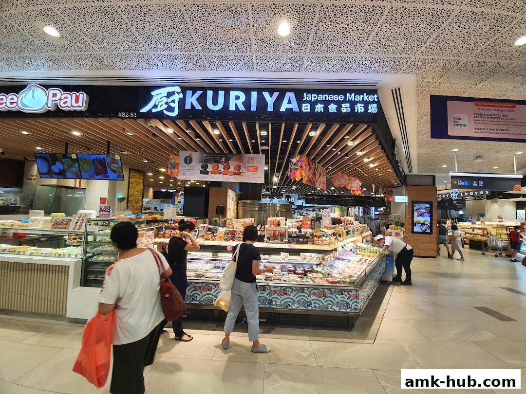 Kuriya Japanese Market shop front with various food items displayed in refrigerated cases.