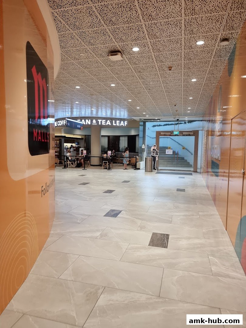 A view of The Coffee Bean and Tea Leaf shop entrance in a mall hallway.