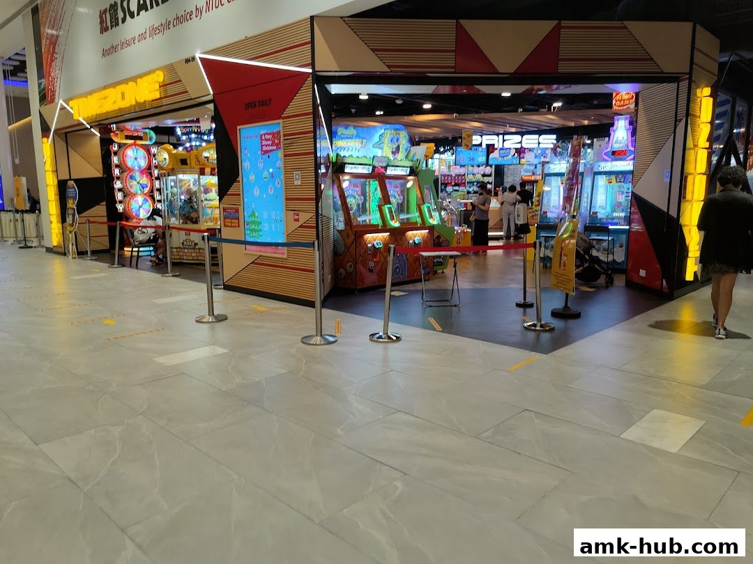The entrance to a Timezone arcade with various game machines and prize displays.