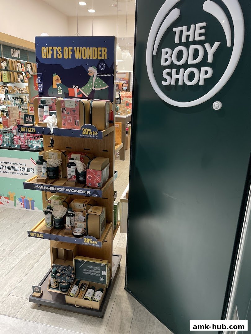 The Body Shop store display featuring gift sets and a "Gifts of Wonder" promotion.