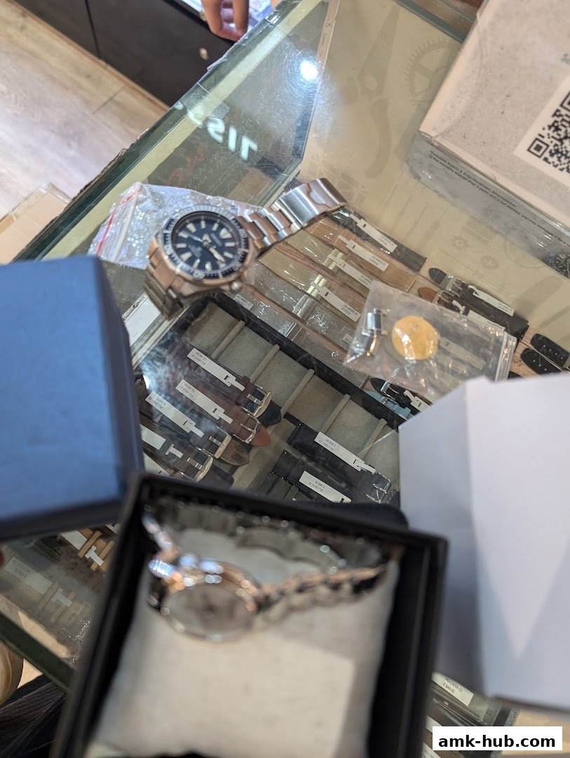 A display of watches and watch straps inside a retail store.