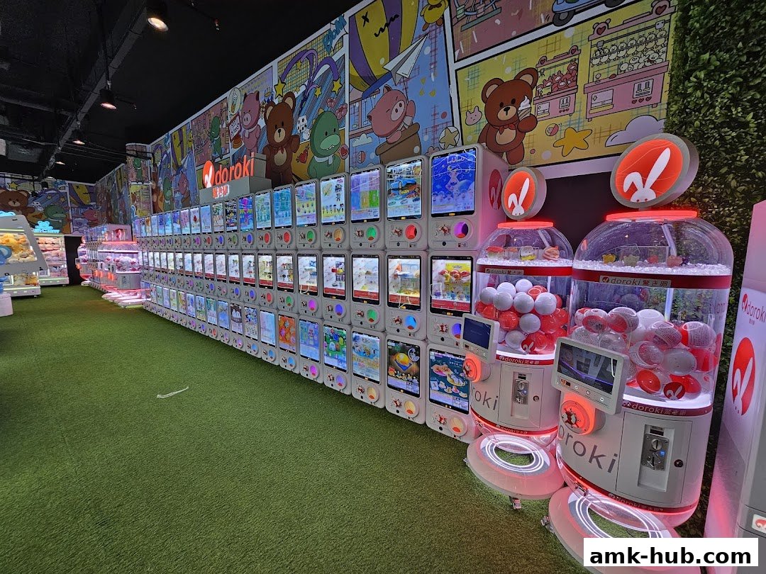 A brightly lit arcade with rows of claw machines and prize dispensers.