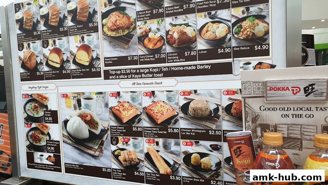 A menu board displaying various local Singaporean dishes and snacks with prices.