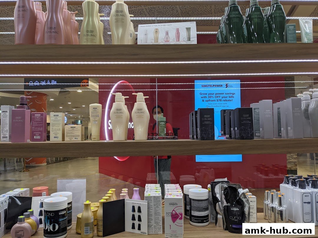 Shelves stocked with various hair care products, including shampoos and conditioners.