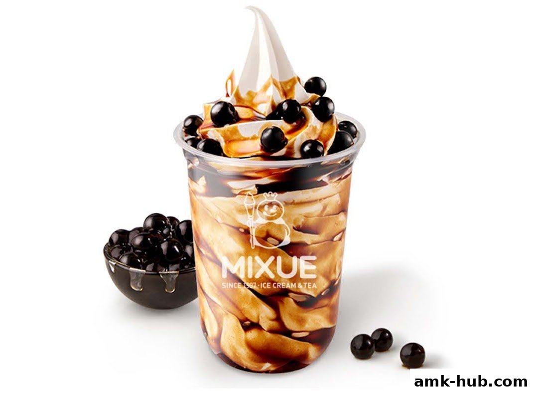 A delicious brown sugar pearl soft serve ice cream with a side of pearls.