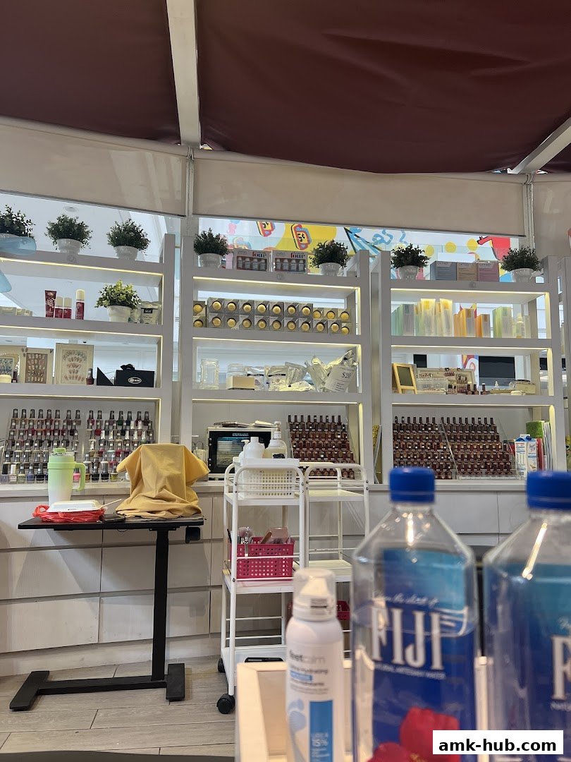 Interior view of a beauty or wellness shop with shelves stocked with products.