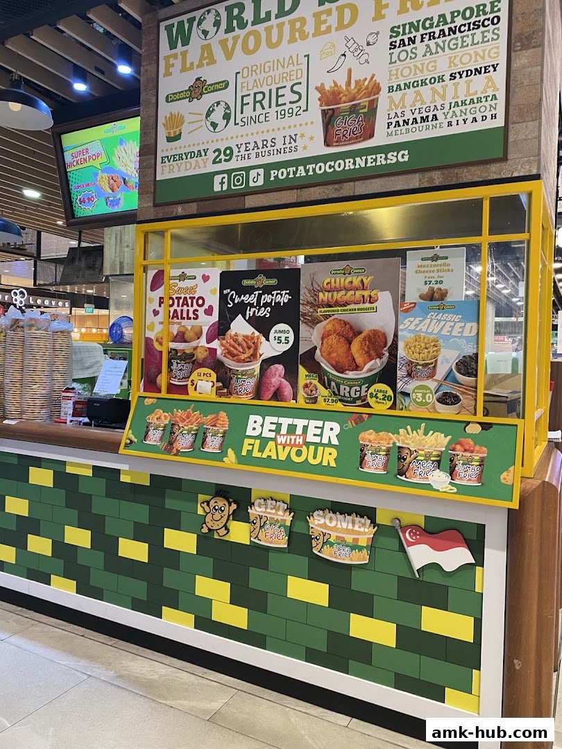 Potato Corner shop counter displaying various flavored fries, nuggets, and sweet potato items.