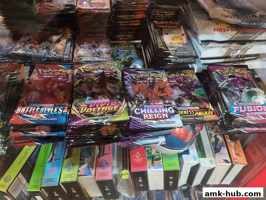 A display of various Pokémon trading card game booster packs and starter decks.