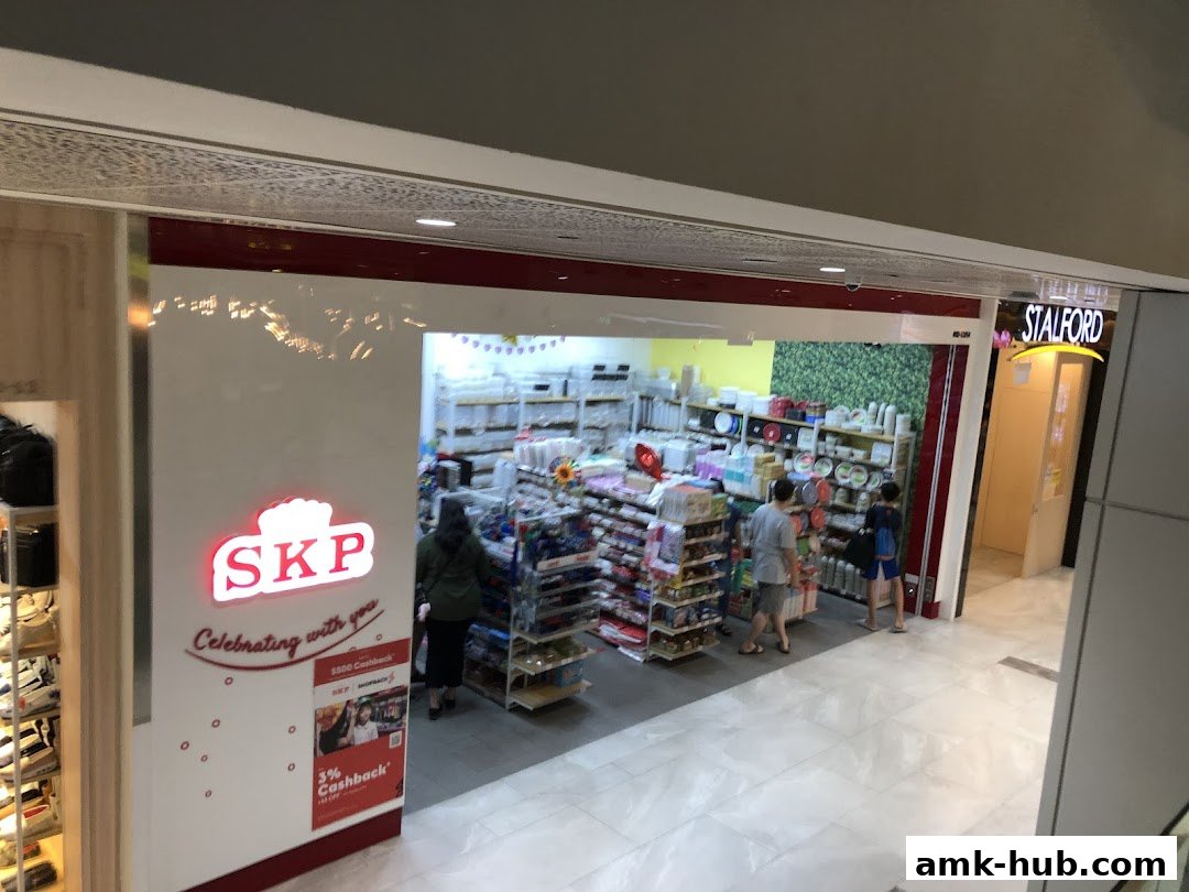 The SKP store entrance, showcasing shelves stocked with various household items and products.