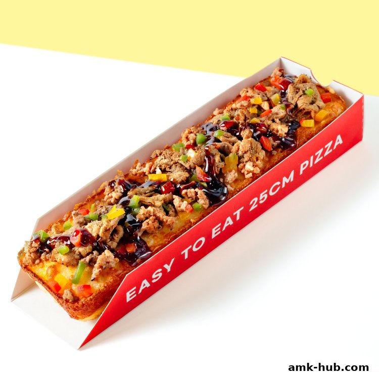 A long, rectangular pizza topped with meat, vegetables, and sauce in a red box.