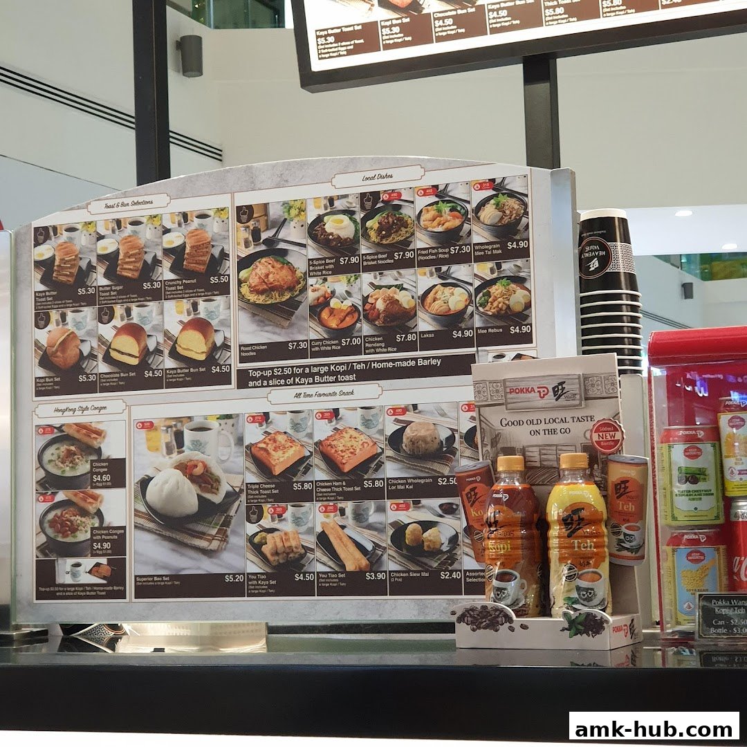 A menu board displaying various local dishes, snacks, and beverage sets from Heavenly Wang.