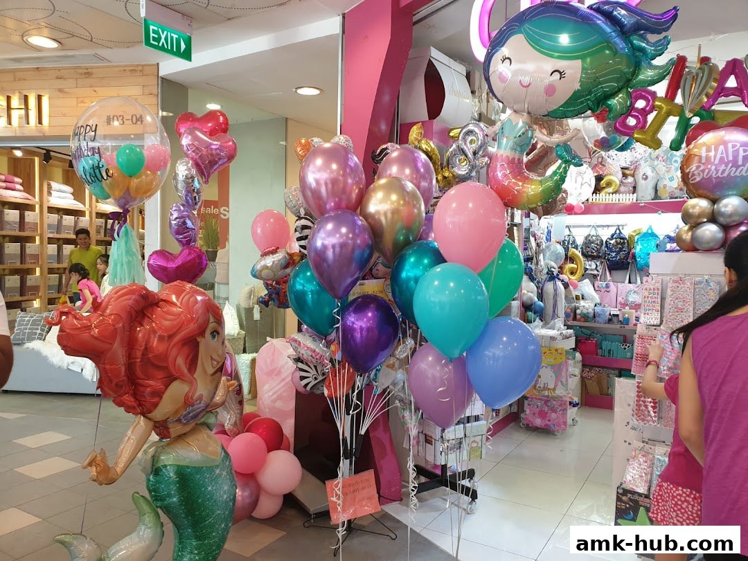 A shop interior filled with a vibrant display of colorful balloons, including character-themed ones.