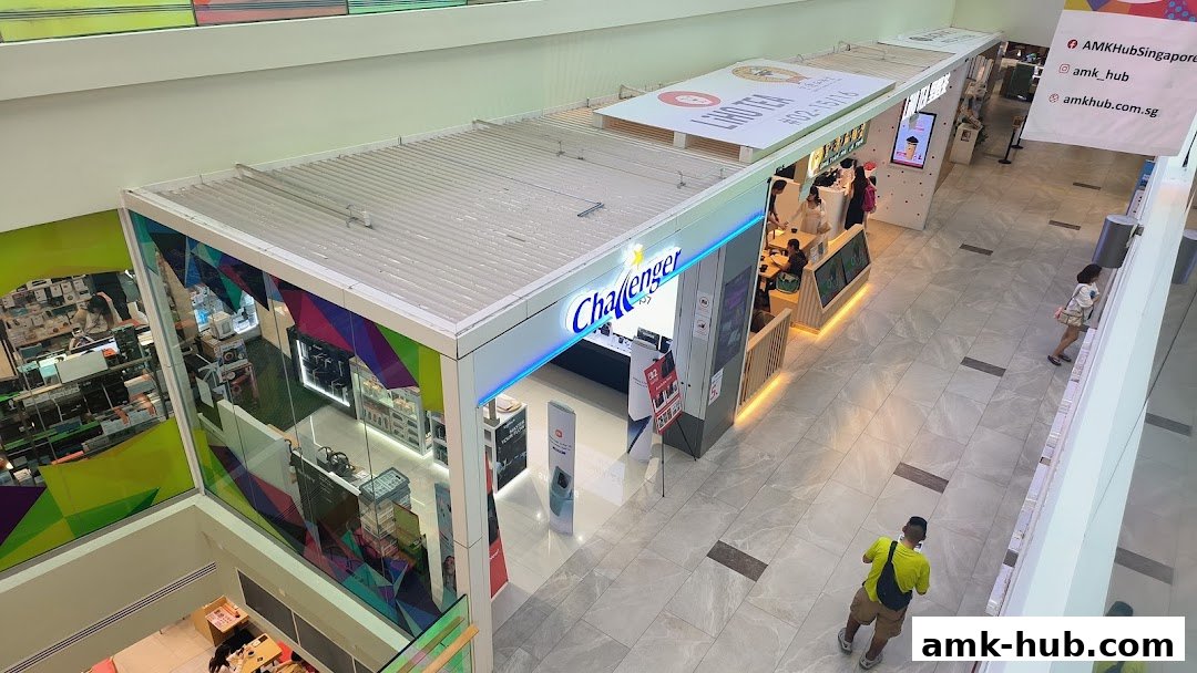 An aerial view of the Challenger electronics store and a LiHo bubble tea stall in a mall.