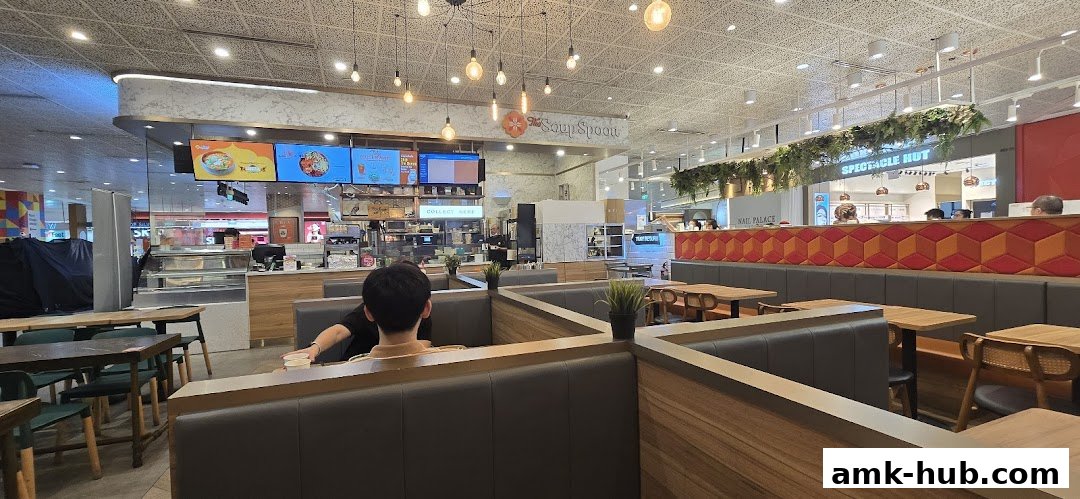 Interior view of The Soup Spoon restaurant with seating and a counter.