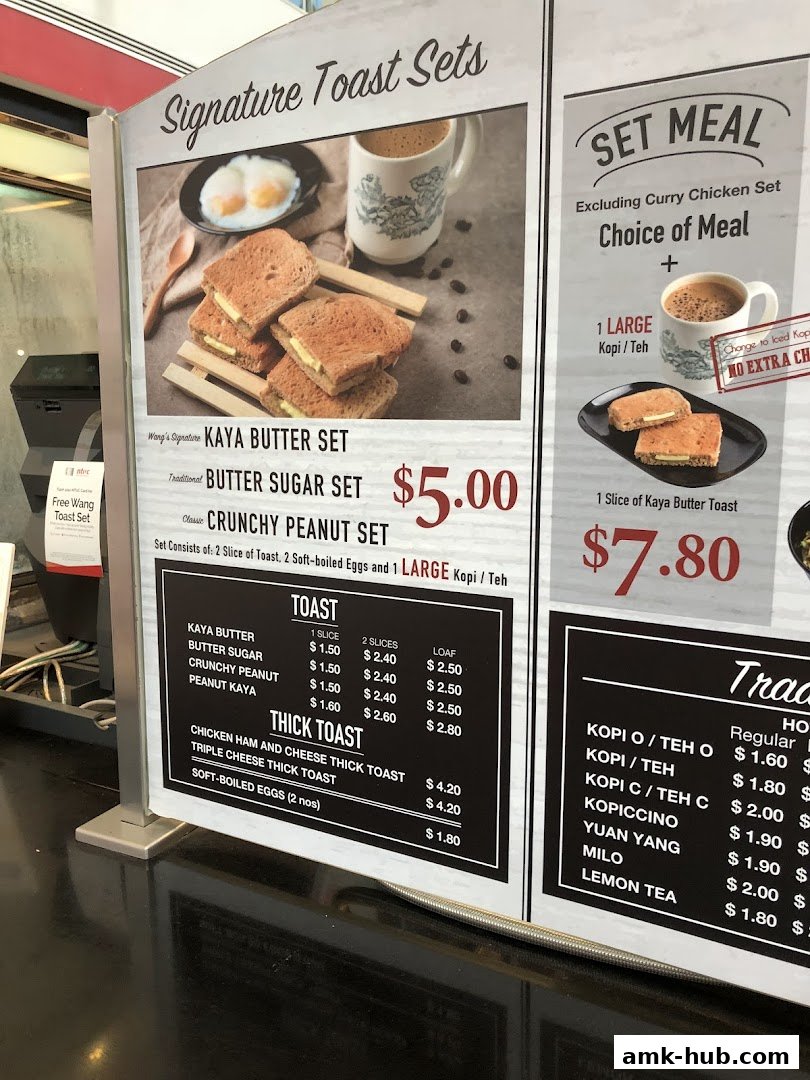 A menu board displaying signature toast sets, set meals, and various toast options with prices.