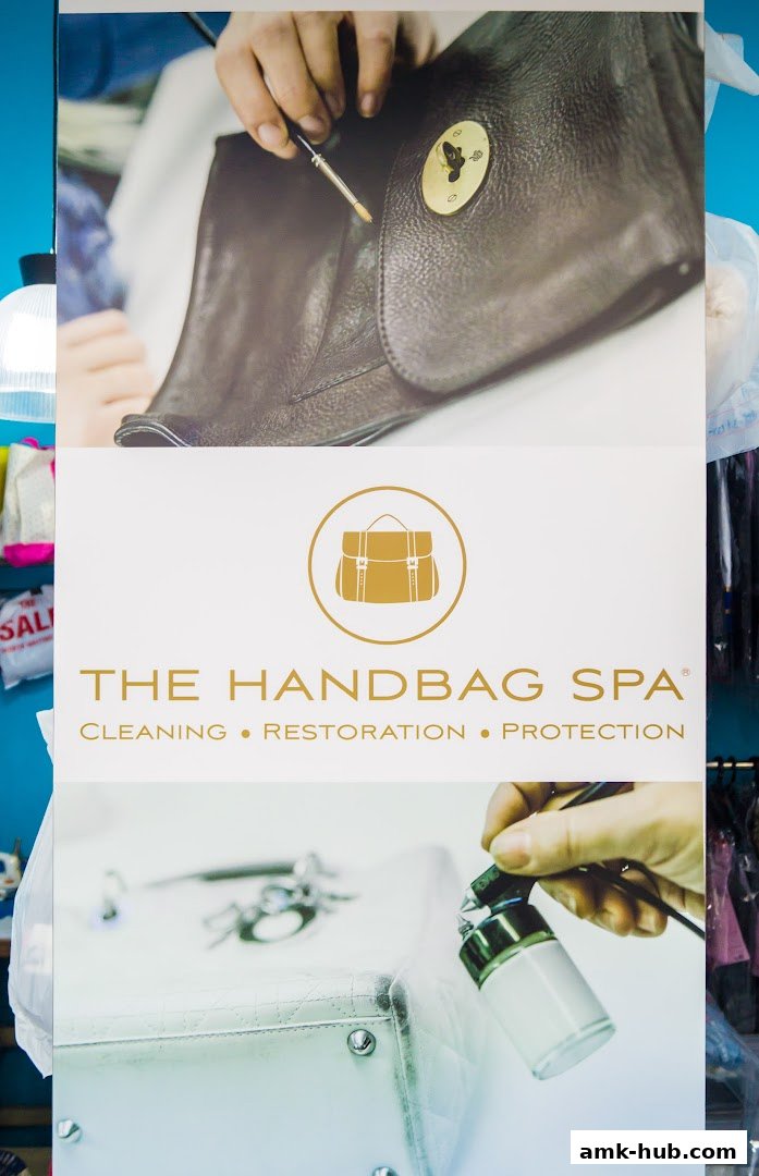A sign for 'The Handbag Spa' showcasing cleaning, restoration, and protection services for handbags.