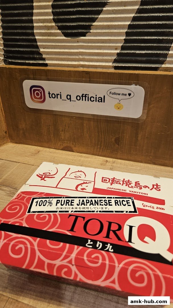 A box from TORI-Q, a Japanese Yakitori restaurant, featuring their logo and Instagram handle.