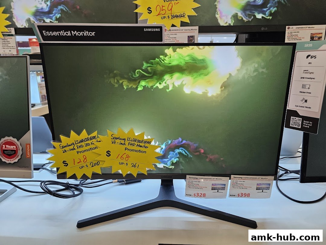 A close-up view of Samsung monitors on display with promotional price tags.