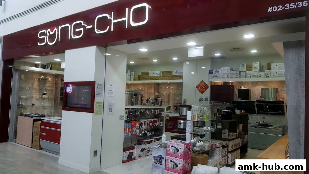 The exterior of the Song-Cho kitchenware store, showcasing various appliances and cookware.